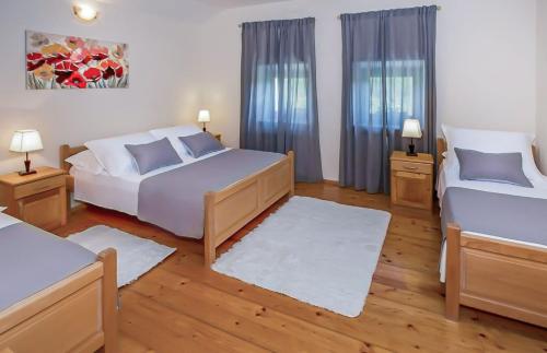 Posteľ alebo postele v izbe v ubytovaní Villa Ognjistar in the hinterland of Makarska Riviera
