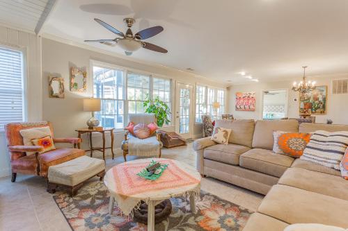 a living room with a couch and chairs at Creekside Paradise in Tybee Island