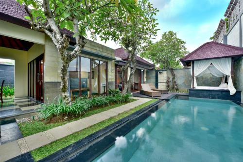 an image of a swimming pool in a house at The Khayangan Dreams Villa, Seminyak in Seminyak