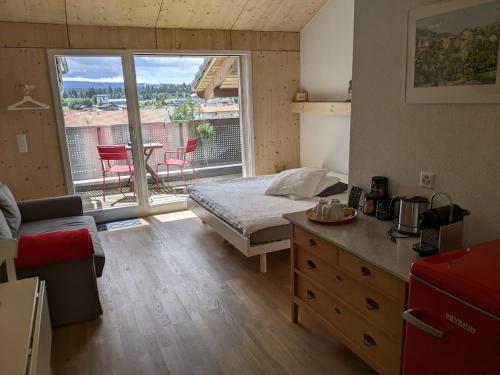 Postel nebo postele na pokoji v ubytování Gîte Chez Toinette