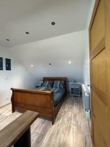Katil atau katil-katil dalam bilik di Petit Duplex Proche Mer