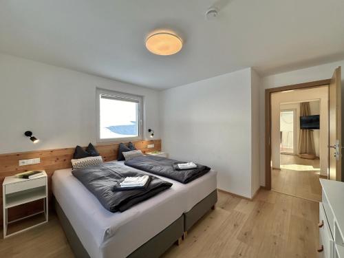 Katil atau katil-katil dalam bilik di Ribisel Apartments für Familien - Alpentherme inklusive!