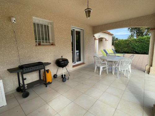 Balkón nebo terasa v ubytování Villa St Cyprien piscine privée vélos wifi