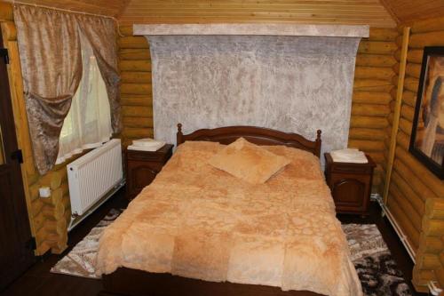Postel nebo postele na pokoji v ubytování Poiana Bradului Complex Hotelier & Restaurant