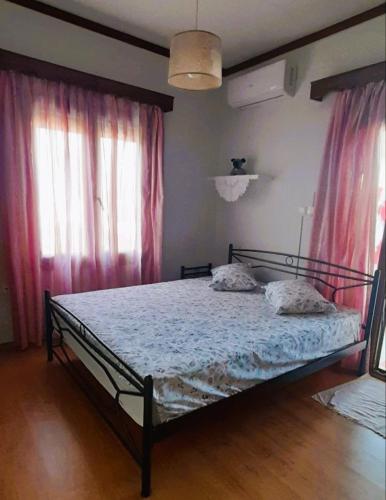 Łóżko lub łóżka w pokoju w obiekcie Araucaria home -the best Sunset view-