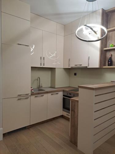 Η κουζίνα ή μικρή κουζίνα στο MM Apartment