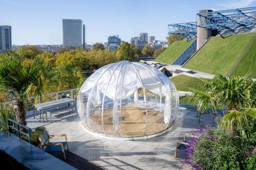 a glass dome on a roof with a garden at Novotel Paris Centre Bercy in Paris