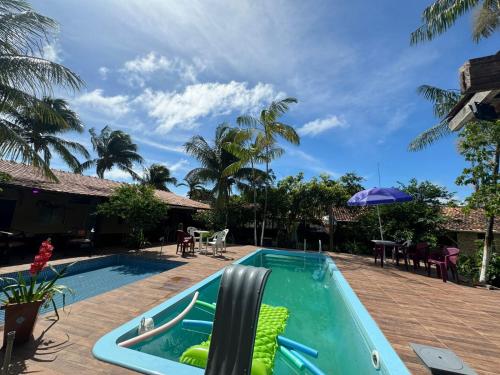 The swimming pool at or close to Pousada Umuarama