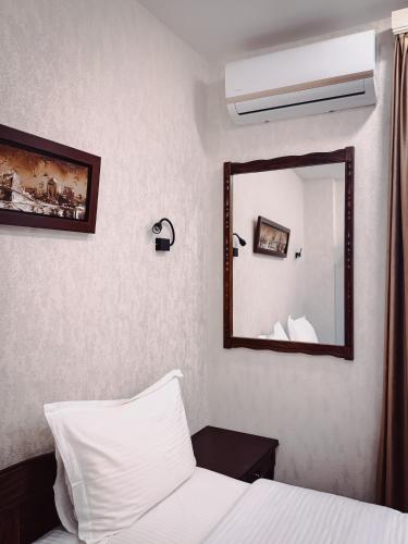 Ένα ή περισσότερα κρεβάτια σε δωμάτιο στο Aspar Boutique Hotel