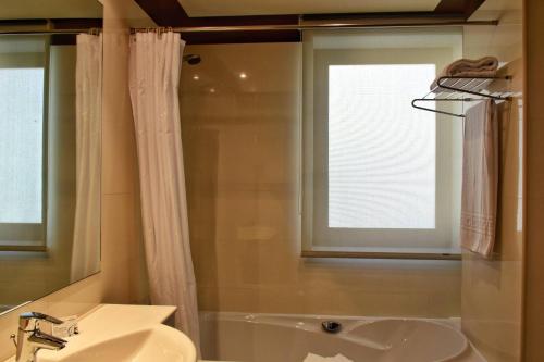 Koupelna v ubytování Hotel Alda Carril