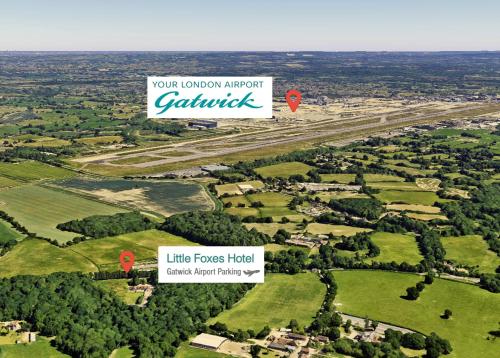 an aerial view of an airport with a runway at Little Foxes Hotel & Gatwick Airport Parking in Crawley
