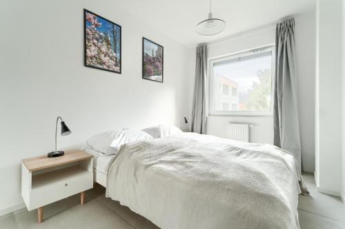 Llit o llits en una habitació de Apartament Chopina - Unique Apartments