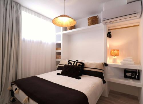 מיטה או מיטות בחדר ב-Villa Karla, Agios Prokopios