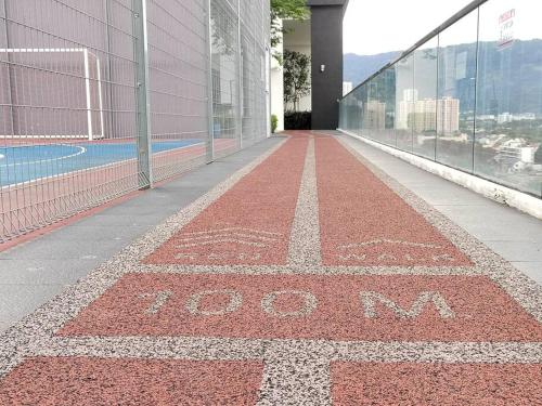 a red floor with the word toma written on a building at Seaview Infinity Pool , 40th , 9pax, 3Rooms 2Carpark in Jelutong