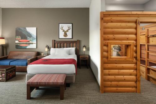 Ένα ή περισσότερα κρεβάτια σε δωμάτιο στο Great Wolf Lodge Georgia