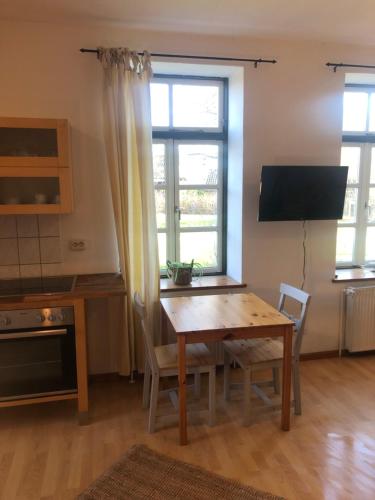 Televisyen dan/atau pusat hiburan di Das Abendrote Haus- Kurz und Langzeitvermietung für Monteure