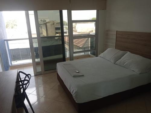 Katil atau katil-katil dalam bilik di Hotel Damys