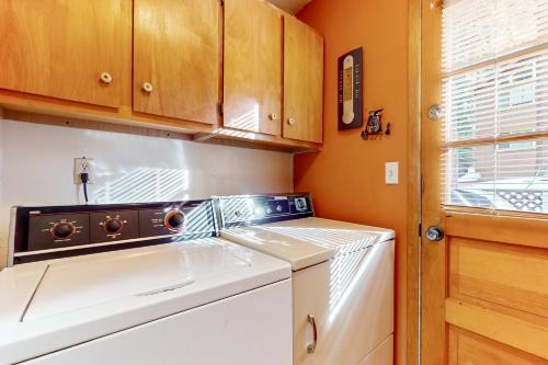 a washer and dryer in a small kitchen at Take me back to Talbot in South Lake Tahoe