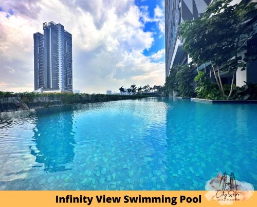 an infinity view swimming pool between two buildings at Trion @ Kuala Lumpur near KLCC TRX by Cityscape in Kuala Lumpur