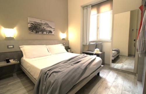 Postel nebo postele na pokoji v ubytování Capo d'Orlando Apartments - Doria 52