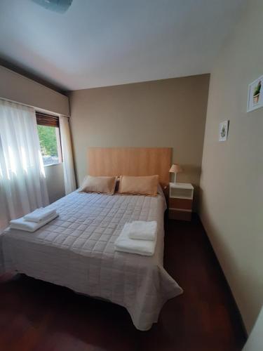 Una cama o camas en una habitación de Gutierrez Home
