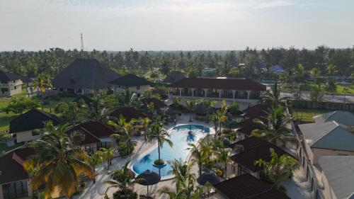 an aerial view of a resort with a swimming pool at Paje Blu Boutique Hotel in Paje
