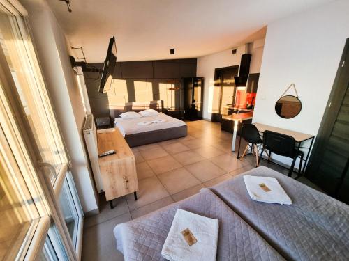 Postel nebo postele na pokoji v ubytování Orange Tree Hotel