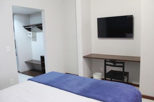 TV a/nebo společenská místnost v ubytování Days inn by Wyndham Uberlândia