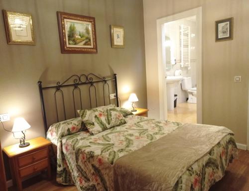 Una cama o camas en una habitación de Hospedaje Don Pelayo