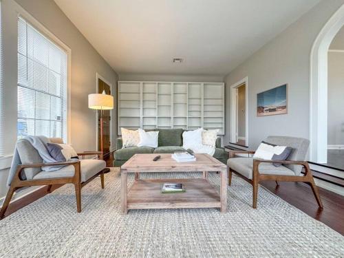 a living room with a couch and a coffee table at New Comfy Bungalow on Washington-Dedicated Office in Waco