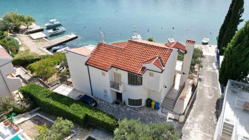 an aerial view of a house with a marina at Villa Divna in Zaboric