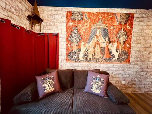 Zona de estar de Le Logis Des Sorciers - Home Homy