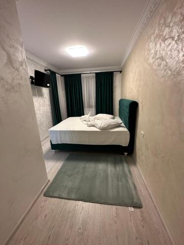 Postel nebo postele na pokoji v ubytování Apartament Simoni