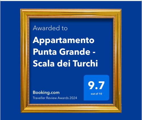 una cornice d'oro con il testo aggiornato in appartamento panama grandale di Appartamento Punta Grande - Scala dei Turchi a Realmonte