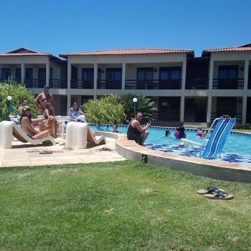 Bazén v ubytování TAIBA - ONDAS DO MAR RESIDENCE Ap 212 nebo v jeho okolí