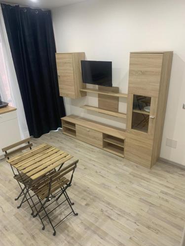 Μια τηλεόραση ή/και κέντρο ψυχαγωγίας στο Loft Home Sweet Home