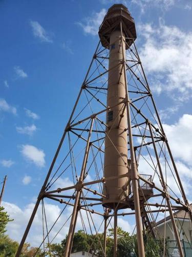 a large pole with a tank on top of it at Iguana Updated Home By Large Imperial River 1 Mi to Beach in Bonita Springs
