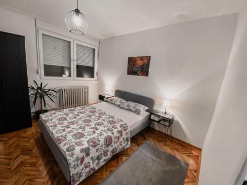Postel nebo postele na pokoji v ubytování Apartman Simon