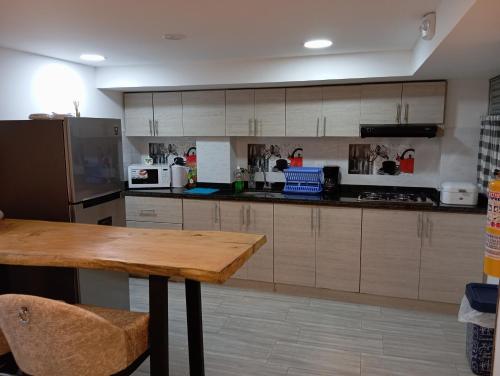 Kuchyň nebo kuchyňský kout v ubytování ApartaHotel Encanto Inn