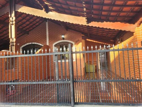 a metal fence in front of a building at Casa Remedi in Solemar