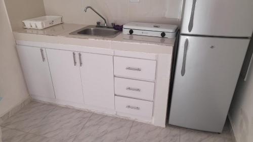 Η κουζίνα ή μικρή κουζίνα στο Residencial Lucy