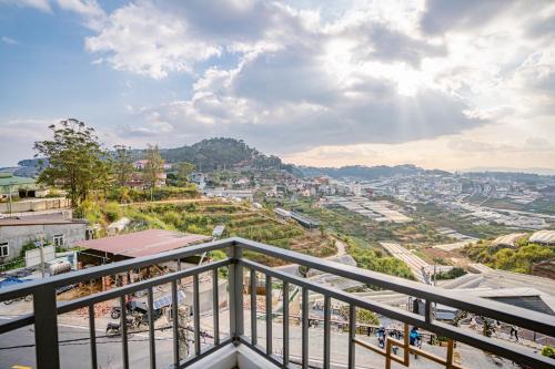a view of a city from a balcony at Xuân Home in Trai Mat