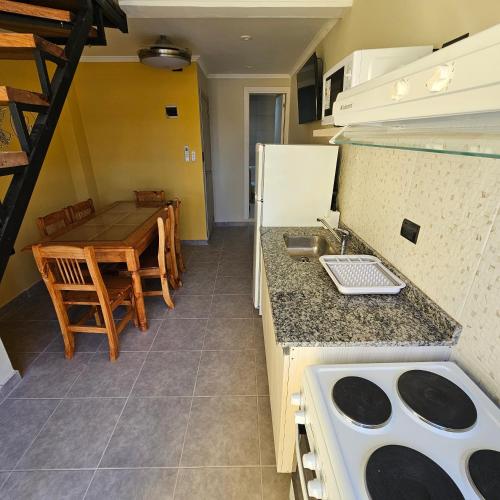 Η κουζίνα ή μικρή κουζίνα στο Brescia Apart Hotel