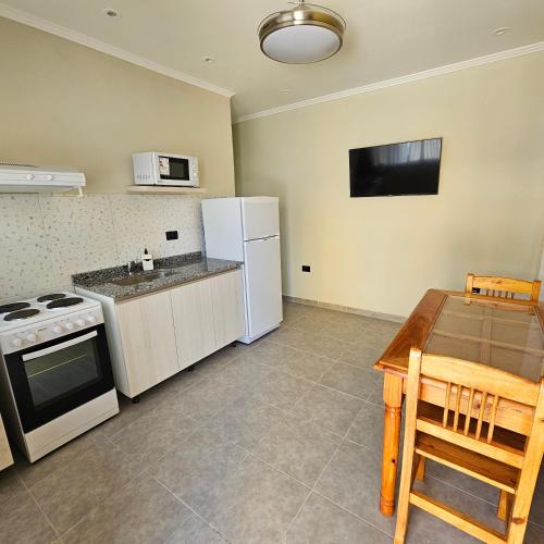 Η κουζίνα ή μικρή κουζίνα στο Brescia Apart Hotel