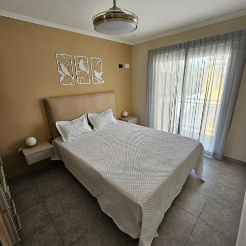 Ένα ή περισσότερα κρεβάτια σε δωμάτιο στο Brescia Apart Hotel