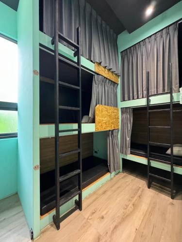 a bunk bed room with two bunk beds at Good hostel 好棧 Green Island in Green Island
