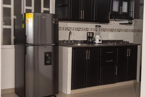 Η κουζίνα ή μικρή κουζίνα στο Apartamento Anawasi, Terraza Privada, Camas Queen y Parqueadero
