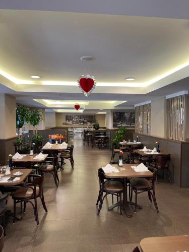Un restaurant sau alt loc unde se poate mânca la Carso Alameda Premium Apartments