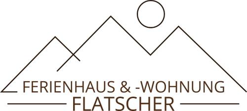 a logo for the fernix mountain flatter at Ferienhaus & -wohnung Flatscher in Waidring