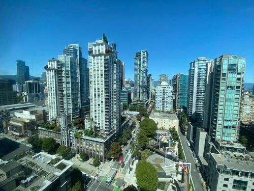 an aerial view of a city with tall buildings at LLT Richard in Vancouver